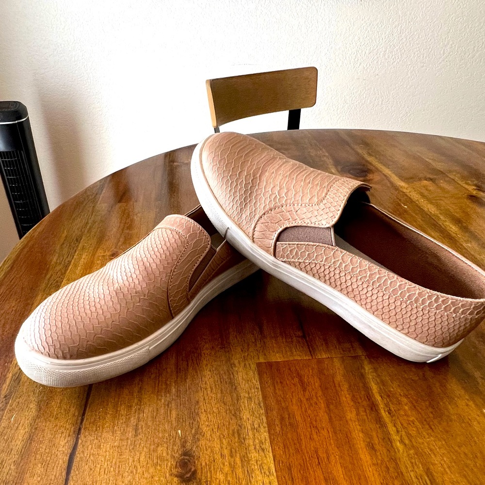 Tan colored slip on shoes, size 10.5. Good condition.